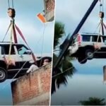 क्रेन से छत पर चढ़ा दी Scorpio